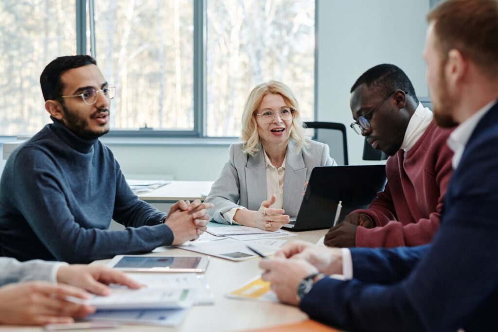Legal team discussing department hiring